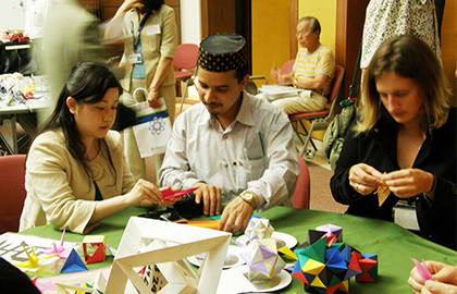 Fellows making origami